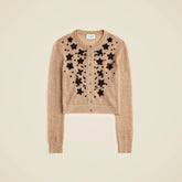 Loose-knit cardigan with floral embellishments