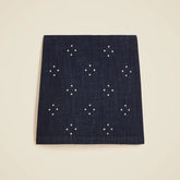 Mini denim skirt with stud embellishments