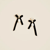 Bow pearl drop earrings