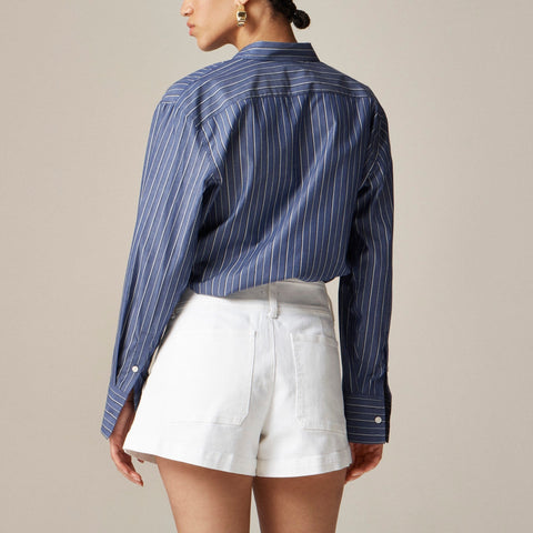 Stacked-button denim short in white