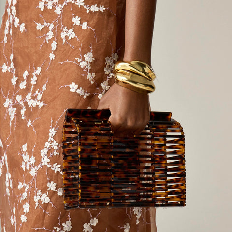 Tortoise shell clutch