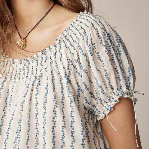 Smocked ruffle-trim top in blue daisy print