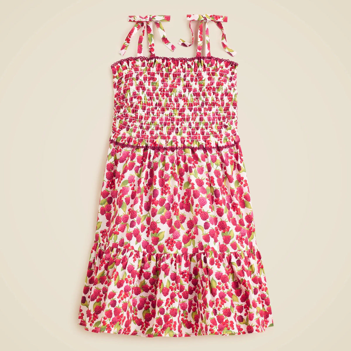 Girls' smocked dress in raspberry burst print