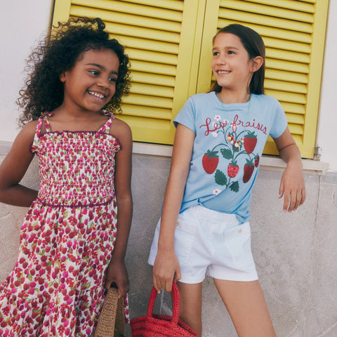 Girls' smocked dress in raspberry burst print