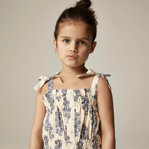 Girls' smocked romper in blooming lilac block print