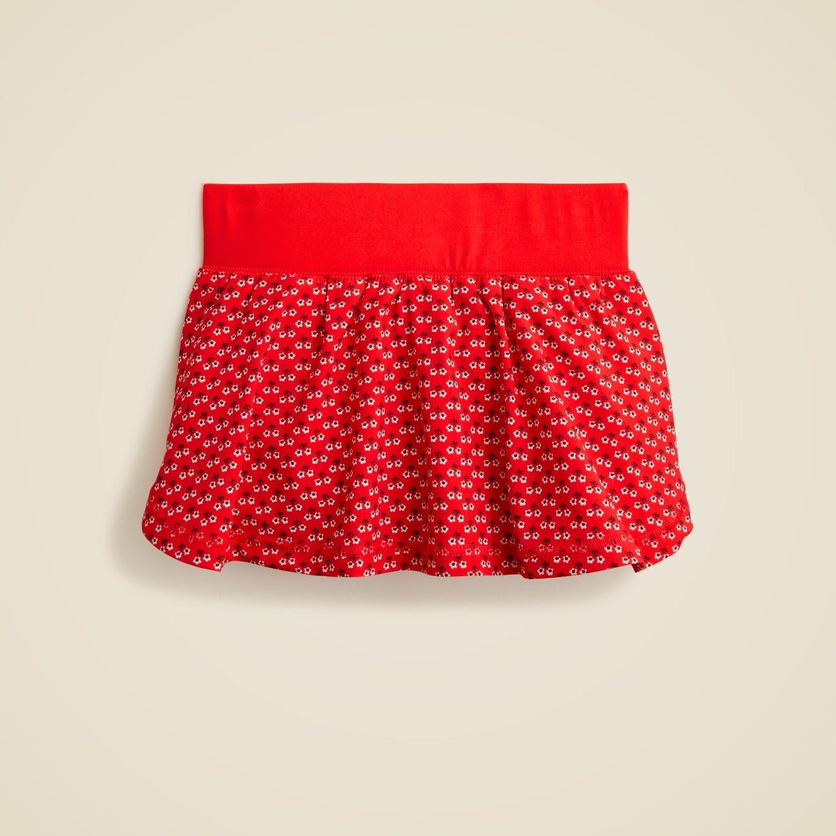 Girls' mini skort in performance jersey