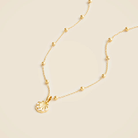 Gold vermeil seashell charm necklace