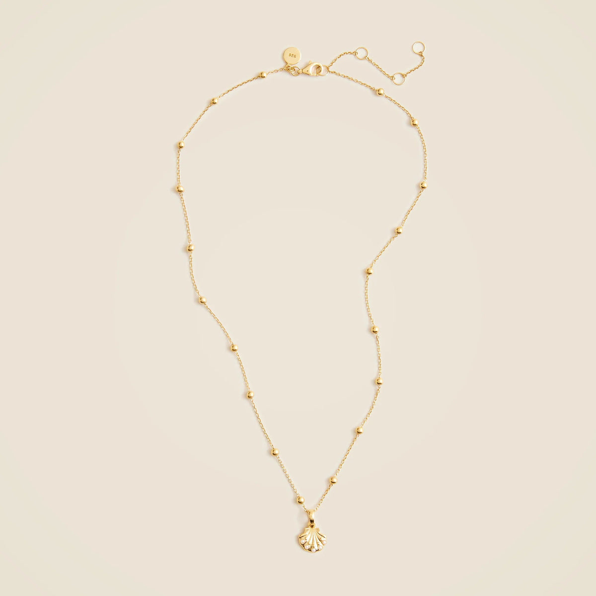 Gold vermeil seashell charm necklace