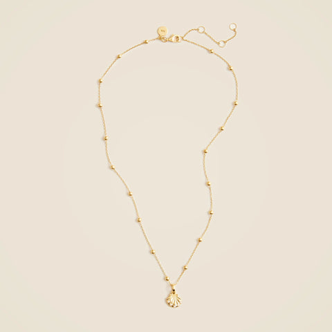 Gold vermeil seashell charm necklace