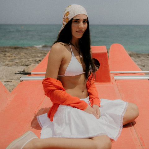 Pleated tie-waist mini skirt