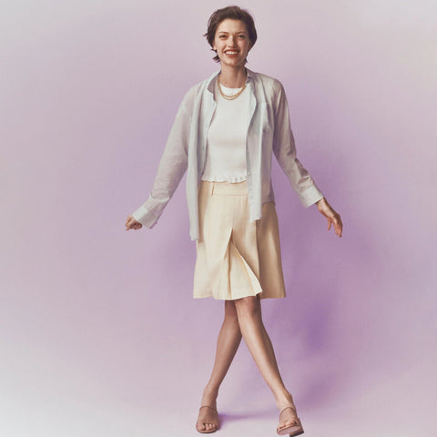 Pleated knee-length skirt in luster canvas