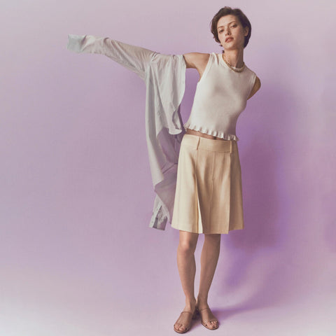 Pleated knee-length skirt in luster canvas