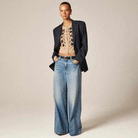 Loose-knit cardigan with floral embellishments