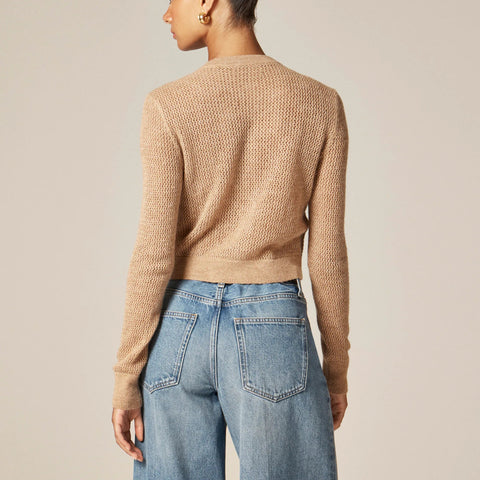 Loose-knit cardigan with floral embellishments