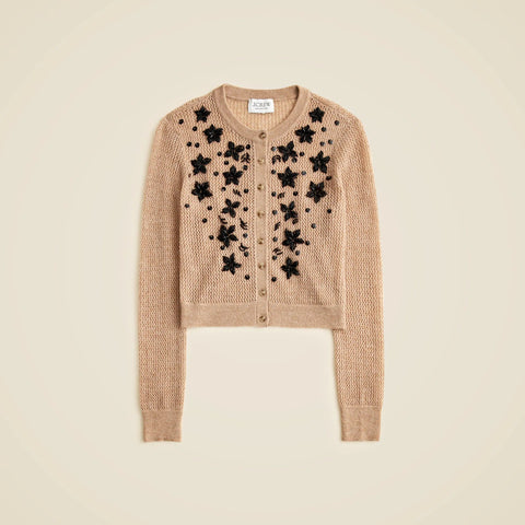 Loose-knit cardigan with floral embellishments