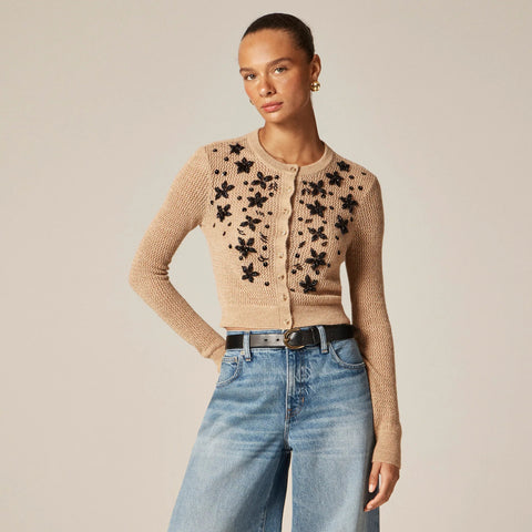 Loose-knit cardigan with floral embellishments