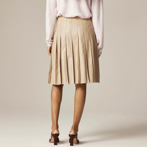 Pleated knee-length skirt in faux leather