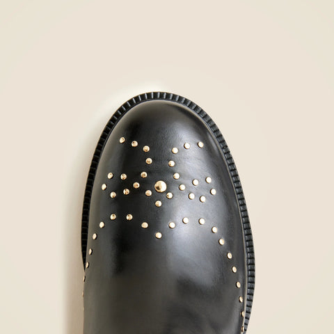 Chelsea wing tip boots in studded leather
