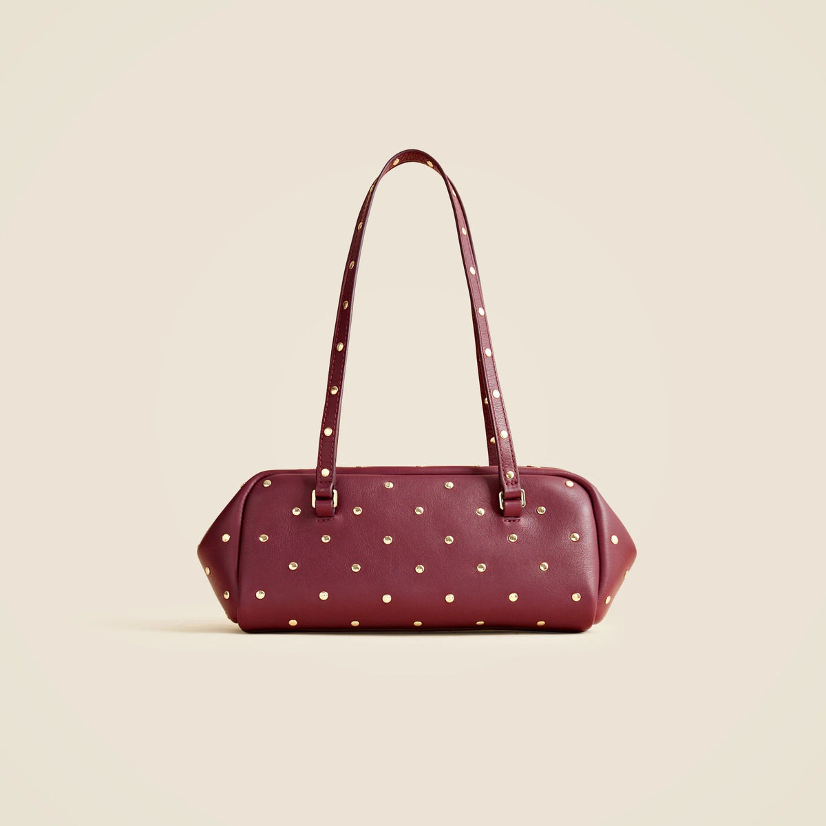 Delphine shoulder bag in studded leather