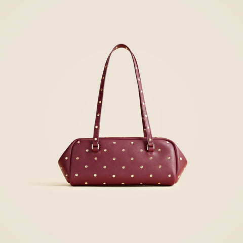 Delphine shoulder bag in studded leather