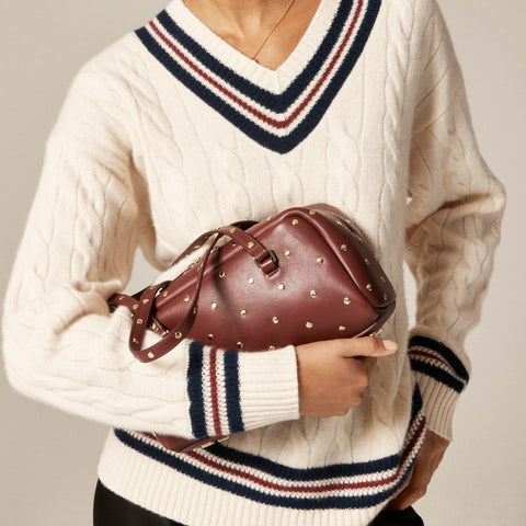 Delphine shoulder bag in studded leather