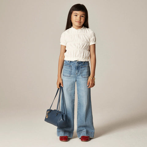 Girls' smocked T-shirt in broken-in-jersey