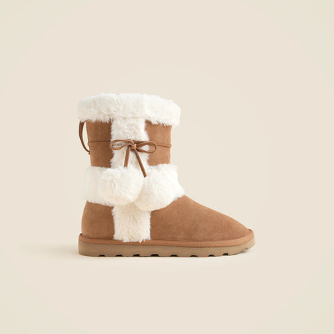 Faux-fur booties in suede with pom-poms
