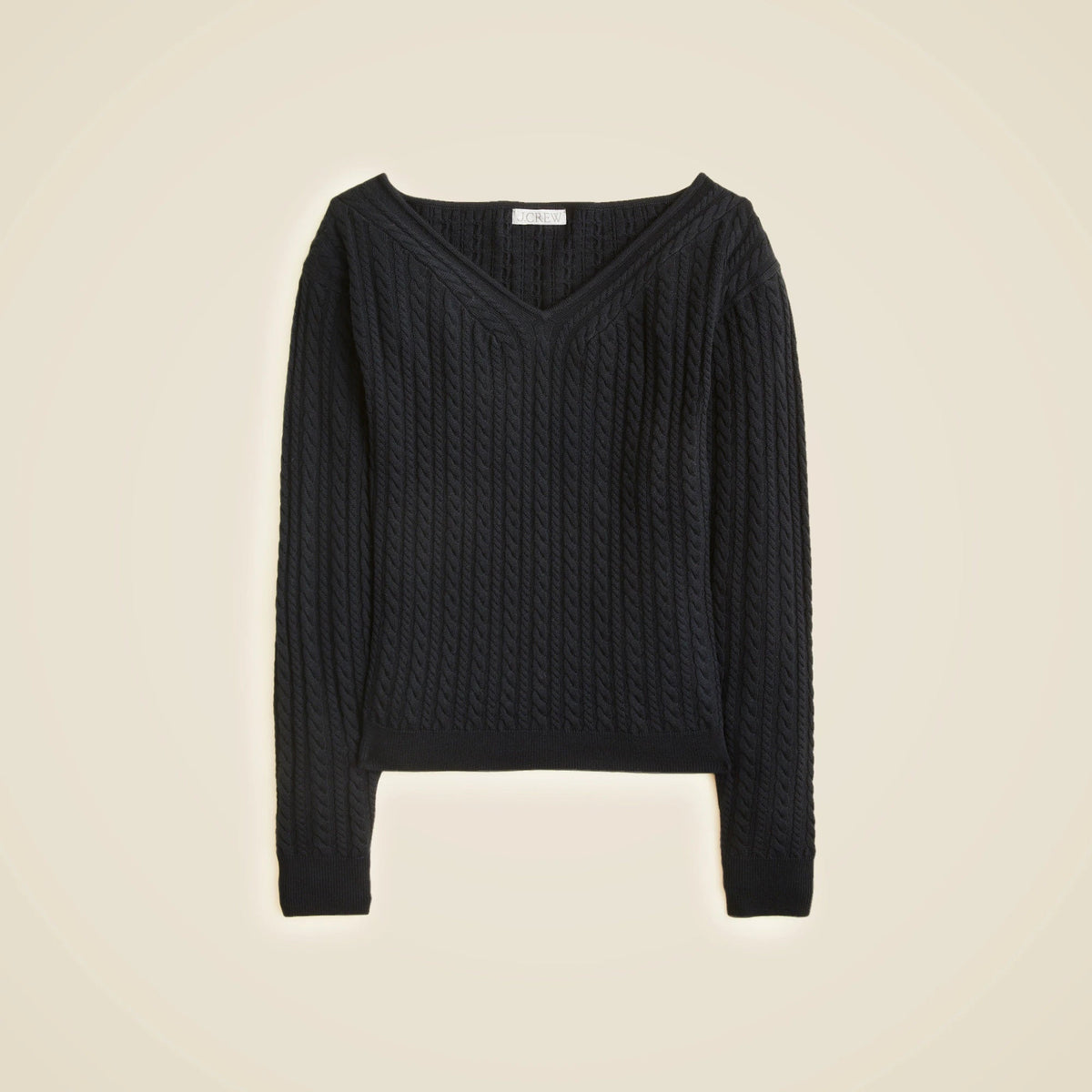 Cable-knit wide V-neck sweater in merino wool