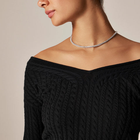 Cable-knit wide V-neck sweater in merino wool