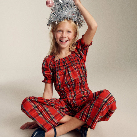 Girls' smocked jumpsuit in Good Tidings plaid