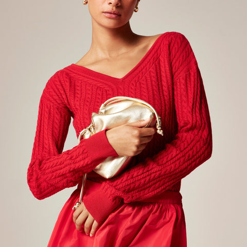 Drawstring pouch bag in metallic leather