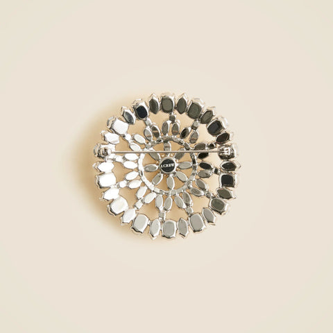 Round crystal brooch